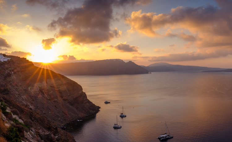 Admiring the incredible Oia Santorini Sunset from Thirea Suites
